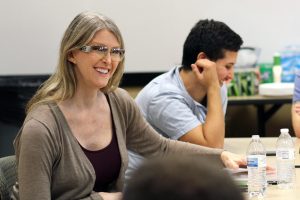 andrea laughs with students